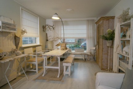 Strandgevoel in dit huisje met sleetse kleuren