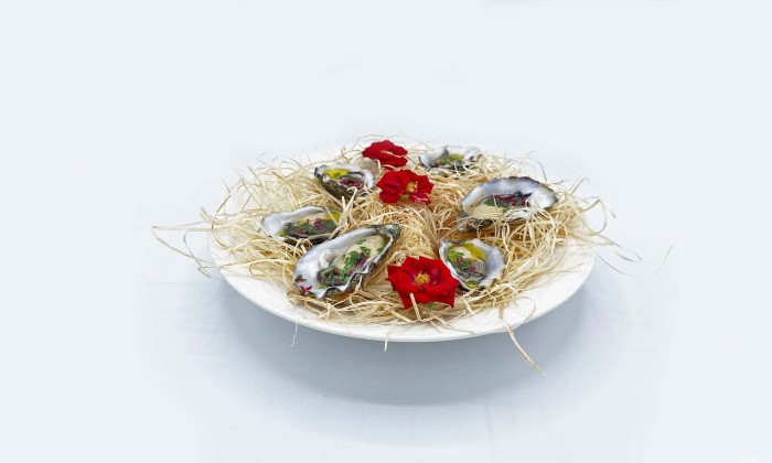 Oesters met Mezcal en rozenblad