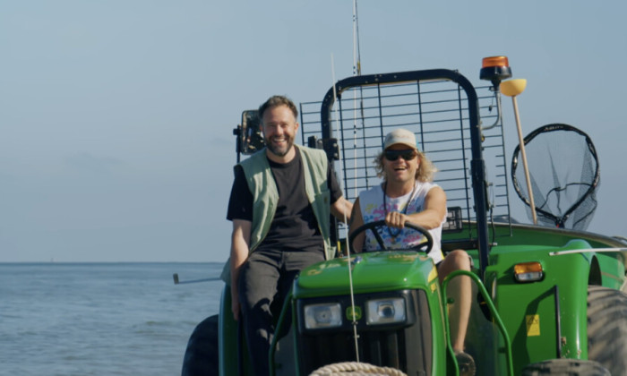 Samuel en visser op tractor
